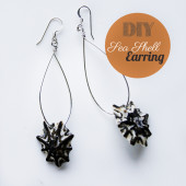 Handmade bông tai bằng vỏ ốc đá.